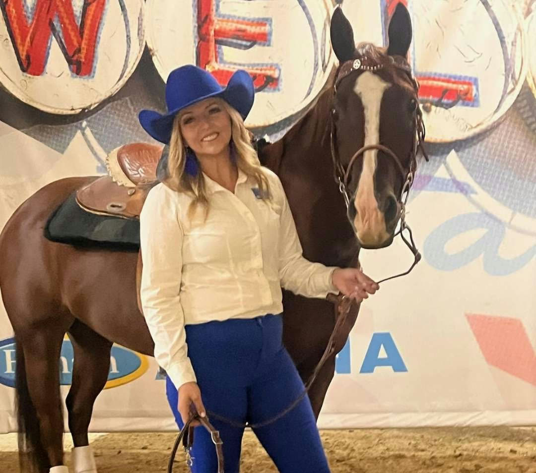 A rider with her horse